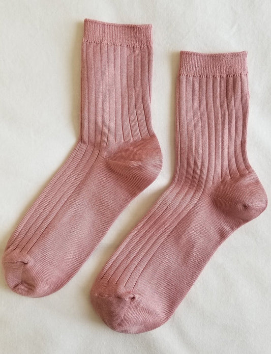 Her Socks in Desert Rose