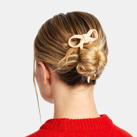 bowhairpin_small_cream_onmodel2_470x_2cad8ac0-e516-4ebb-b850-931f741ed844.webp