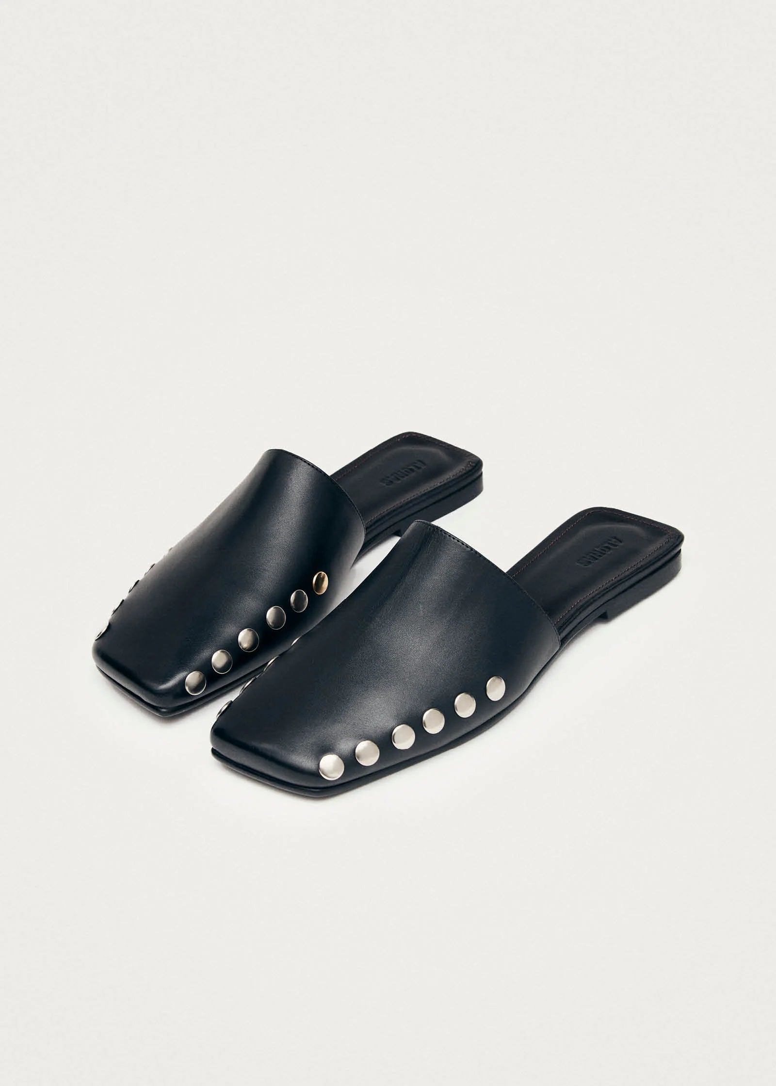 kelly-black-leather-mules-5.webp